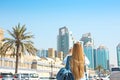 Woman taking mobile photo of the Central Souq in Sharjah City, U Royalty Free Stock Photo