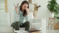 Woman taking off glasses tired of laptop work, problem after long laptop use, eyes fatigue concept Royalty Free Stock Photo