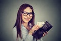 Woman taking out money from wallet Royalty Free Stock Photo