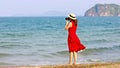 Woman taking photo on beach