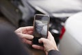 Woman Taking Photo Of Car Accident On Mobile Phone Royalty Free Stock Photo