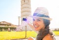 Woman taking photo of leaning tower of pisa Royalty Free Stock Photo