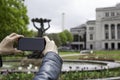 Woman taking photo with mobile cell phone Royalty Free Stock Photo