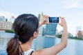 Woman taking photo by mobile phone Royalty Free Stock Photo