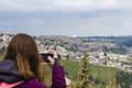 Woman taking photograph with smartphone at enjoying view of Jerusalem Photograph on the phone Old City of Jerusalem