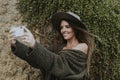 A woman taking photos with her phone Royalty Free Stock Photo