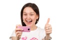 Woman taking a picture by cameraphone Royalty Free Stock Photo