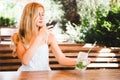 Woman taking picture of food with mobile phone Royalty Free Stock Photo