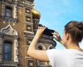 Woman taking pictures of Church. Royalty Free Stock Photo