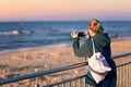 Woman taking pictures on holidays Royalty Free Stock Photo