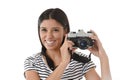 Woman taking pictures posing smiling happy using cool retro and vintage photo camera