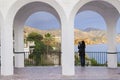 Woman taking pictures with tablet at Balcony Of Europe