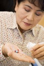 Woman Taking Pills Royalty Free Stock Photo