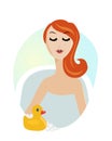 woman taking a relaxing bath with rubber duck