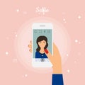 Woman Taking Selfie Photo on Smart Phone. Self portrait picture