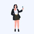 Woman taking selfie photo on smartphone camera casual female cartoon character girl model standing pose flat full length Royalty Free Stock Photo