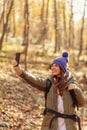 Woman taking selfies in the forest Royalty Free Stock Photo