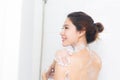 Woman taking a shower enjoying water splashing on her. selective Royalty Free Stock Photo