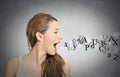 Woman talking with alphabet letters coming out of mouth Royalty Free Stock Photo