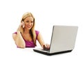 Woman talking on cell phone and using laptop Royalty Free Stock Photo