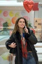 Woman talking by mobile phone