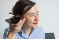 Woman talking on the phone with digital voice assistant Royalty Free Stock Photo