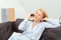 Woman talking on the phone at home