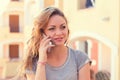 Woman talking at phone isolated outdoors background. Mixt race russian asian model Royalty Free Stock Photo