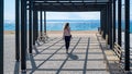A woman talking on the phone, pier, Nikiti, Greece