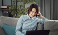 Woman talking phone using laptop Royalty Free Stock Photo