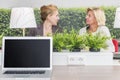 Woman talking in their workarea