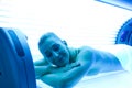 Woman on tanning bed Royalty Free Stock Photo
