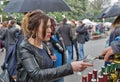 Woman taste wine during Kyiv Food and Wine Festival, Ukraine. Royalty Free Stock Photo