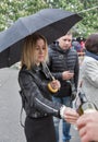 Woman taste wine during Kyiv Food and Wine Festival, Ukraine. Royalty Free Stock Photo