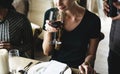 Woman Tasting Red Wine in a Classy Restaurant Royalty Free Stock Photo