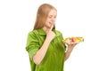 Woman tasting variety of fruits and berries