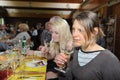 Woman tasting white wine