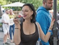 Woman tasting wine at Kyiv Wine Festival in Ukraine
