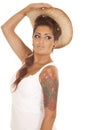 Woman tattoos cowgirl hat on Royalty Free Stock Photo