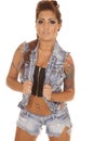 Woman tattoos denim vest facing