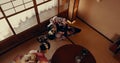 Woman, tea ceremony and Japanese culture in tatami room for religious faith, respect or ritual. Asian person, kneel and