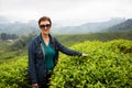 Woman is on tea plantations of Cameron Highlands, Malaysia Royalty Free Stock Photo