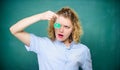 Woman teacher performing experiment with bulb and liquid. Chemistry lesson. Chemistry lab. Interesting and fascinating Royalty Free Stock Photo