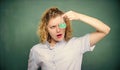 Woman teacher performing experiment with bulb and liquid. Chemistry lesson. Chemistry lab. Interesting and fascinating Royalty Free Stock Photo