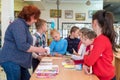 Woman Teacher with primary school students. Teacher talking to schoolchildren Royalty Free Stock Photo