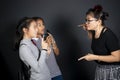 Woman teacher and two girl student excited