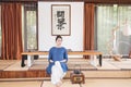 A woman with a teapot-China tea ceremony