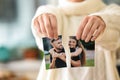 Woman tearing up photo of happy couple, closeup. Concept of divorce Royalty Free Stock Photo