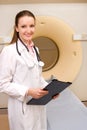 Woman Technologist with CT Scan Machine Royalty Free Stock Photo