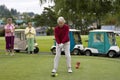 Woman Teeing Off Royalty Free Stock Photo